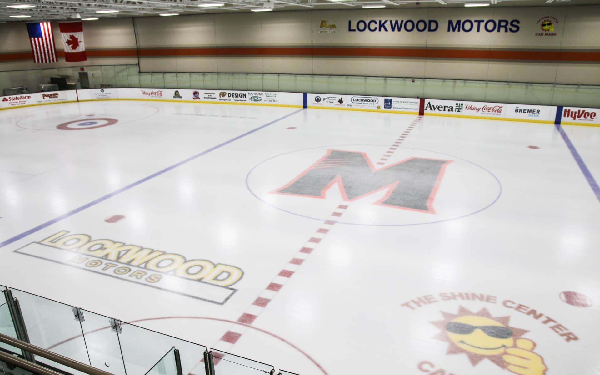Red Baron Arena ice rink with logos