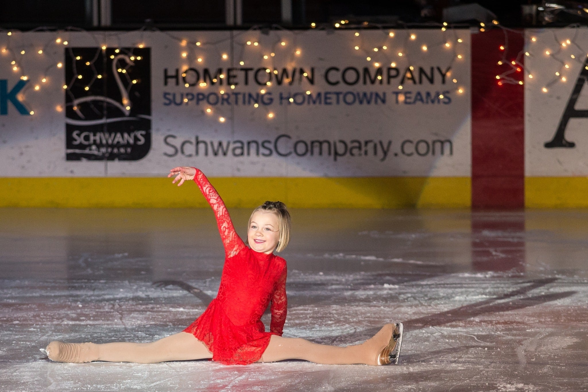 figure skater in red dress