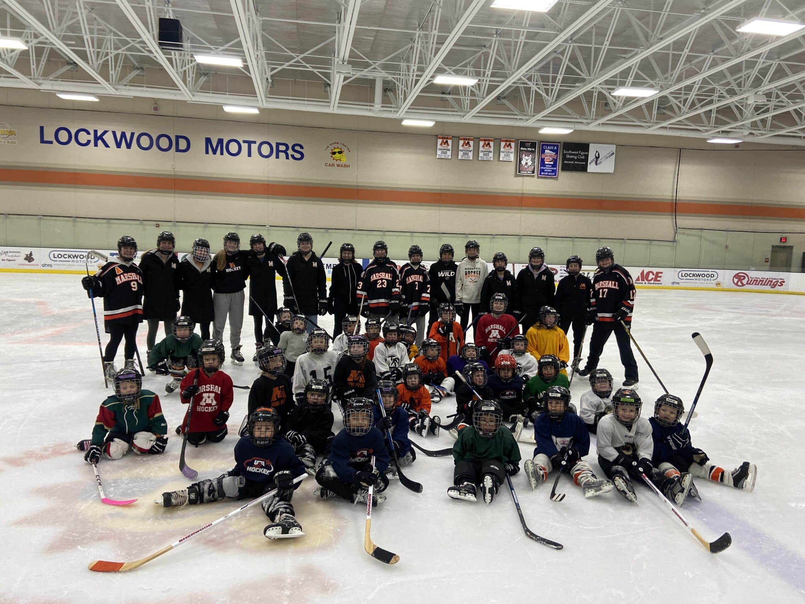 group of ice hockey players on ice