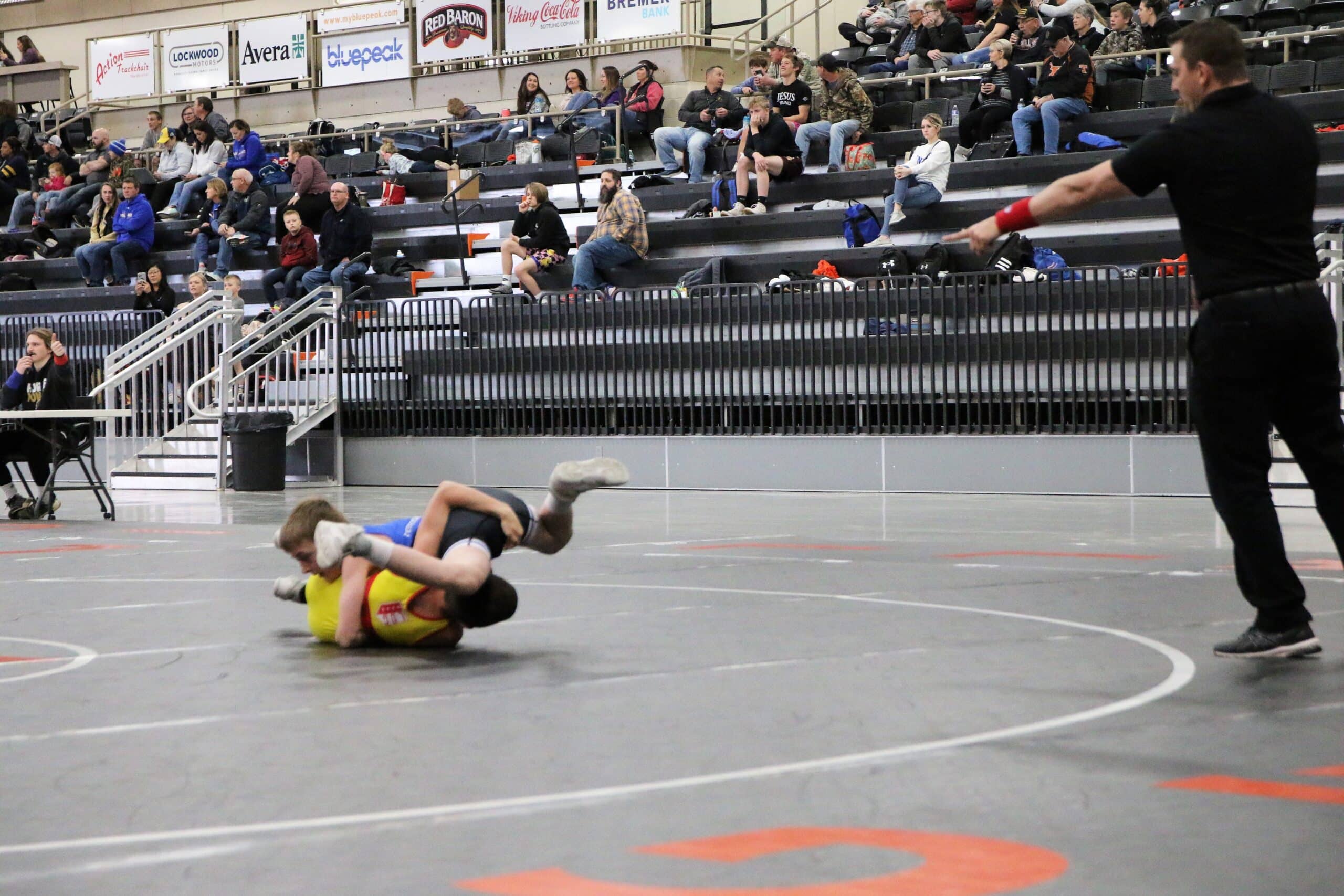 two boys competing in fighting tournament