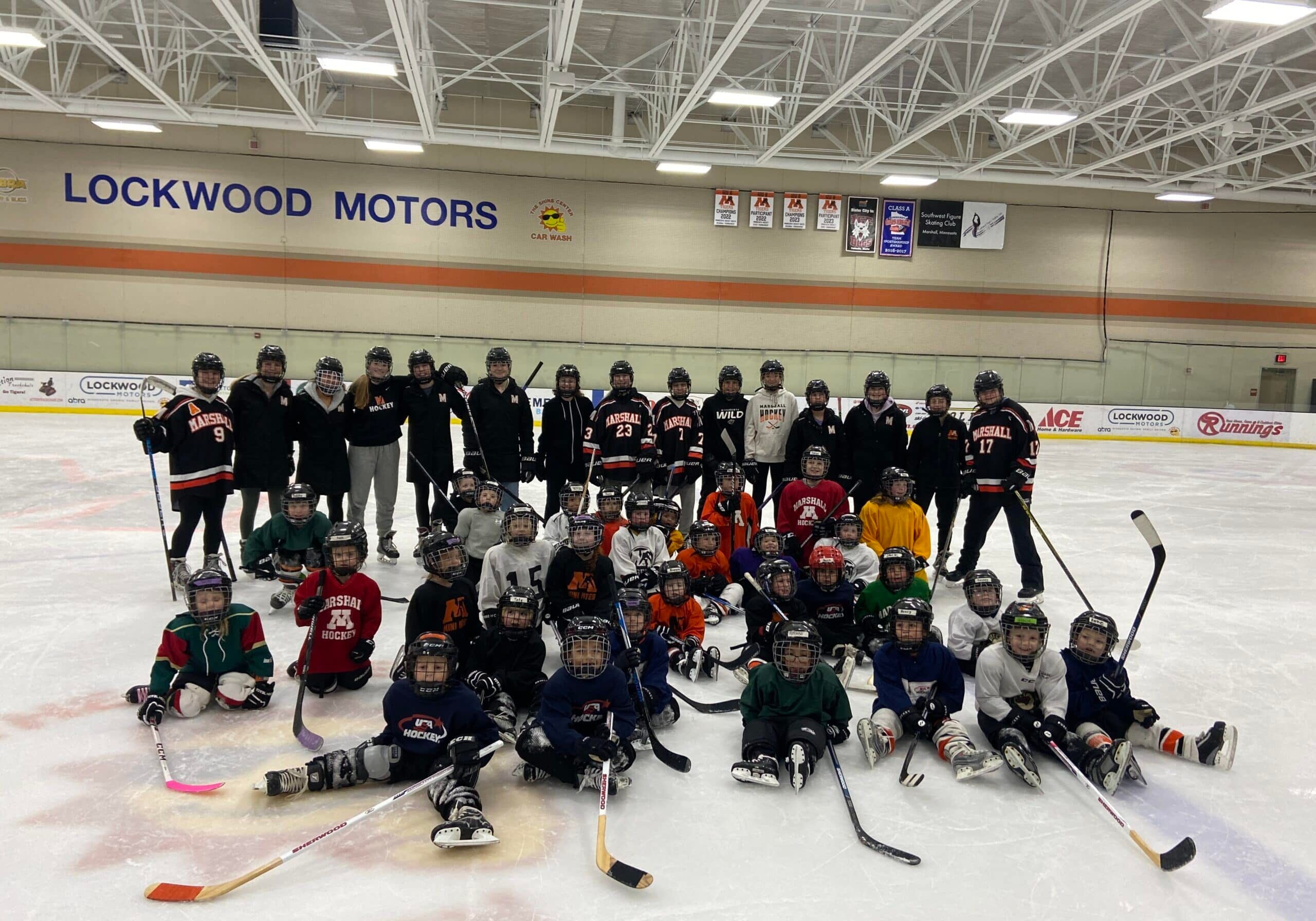 group of ice hockey players on ice